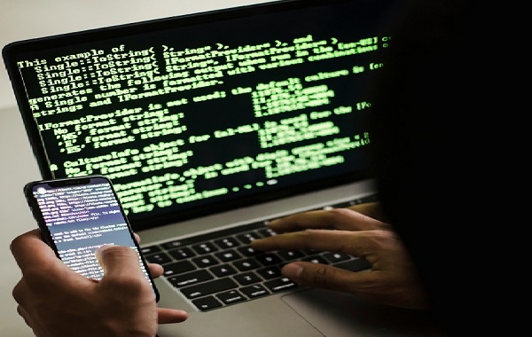 Hacking website on laptop